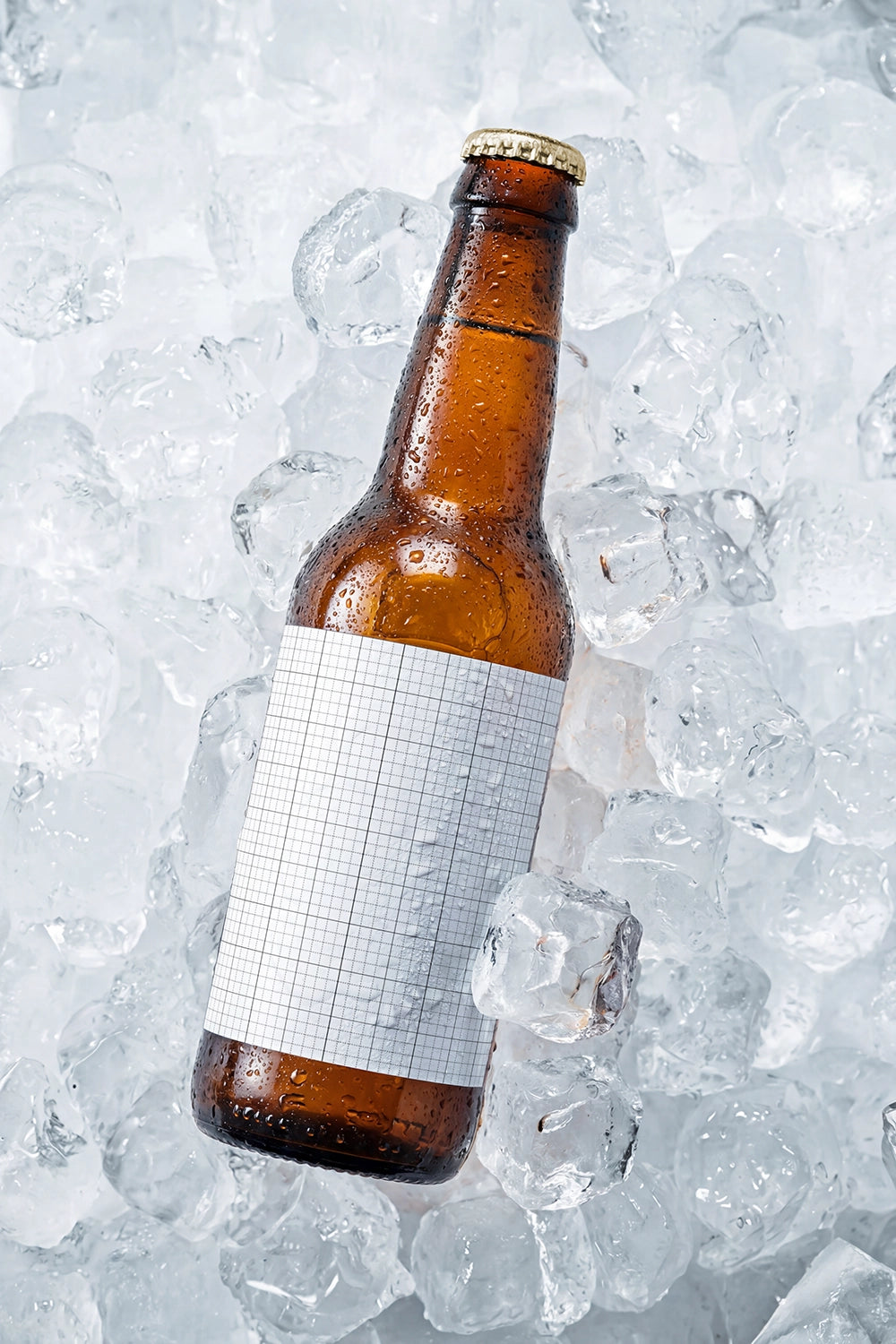 Cold beverage packaging mockup with realistic beer bottle and ice cubes