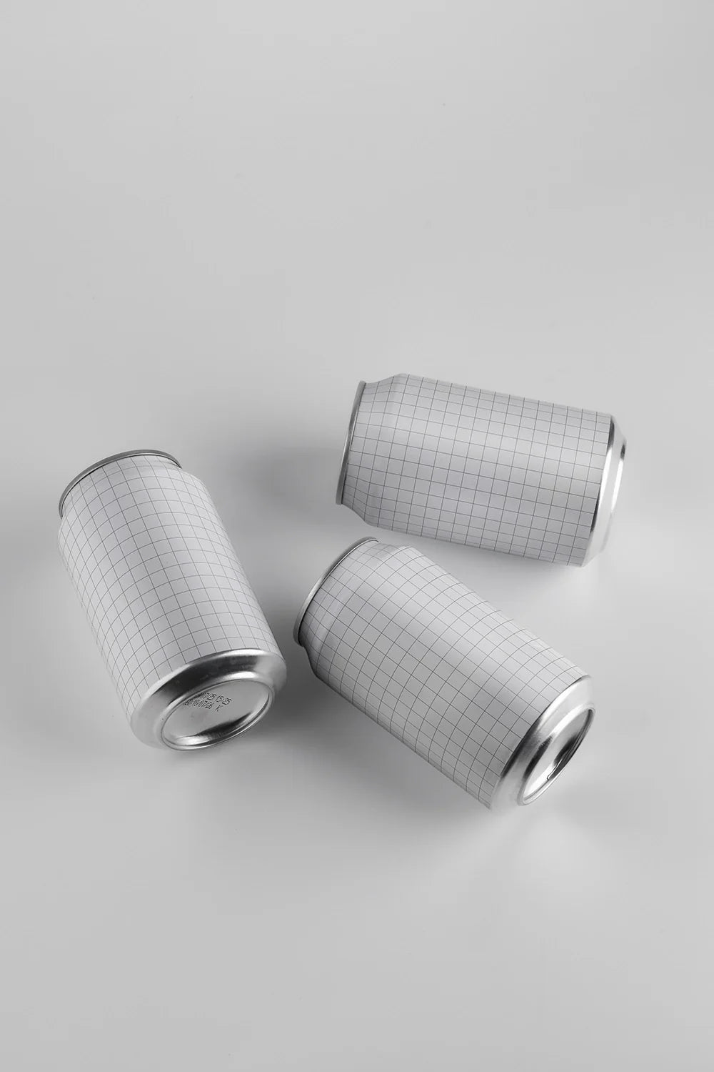 Aluminum can mockup set three cans dynamic top angle composition PSD packaging template modern style