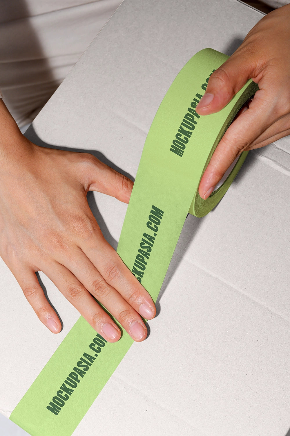 shipping box tape mockup with logo print and natural lighting packaging scene