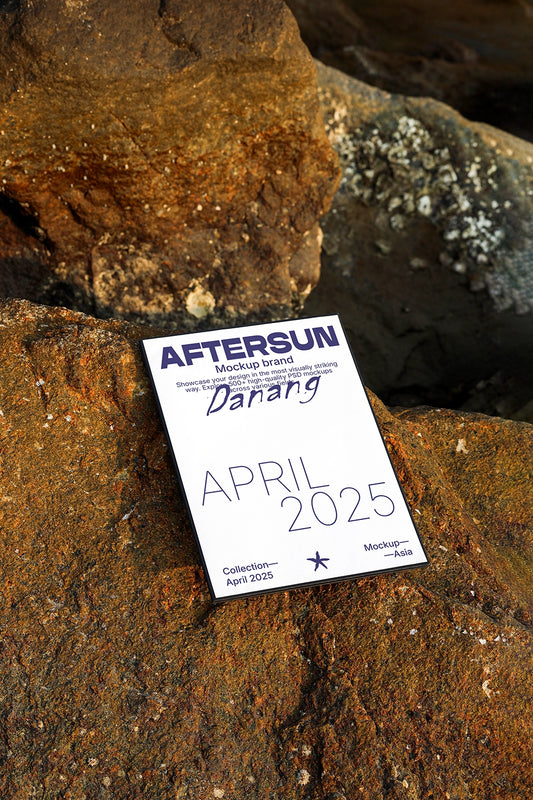 poster mockup on textured rock surface with warm sunlight and realistic shadow outdoor scene