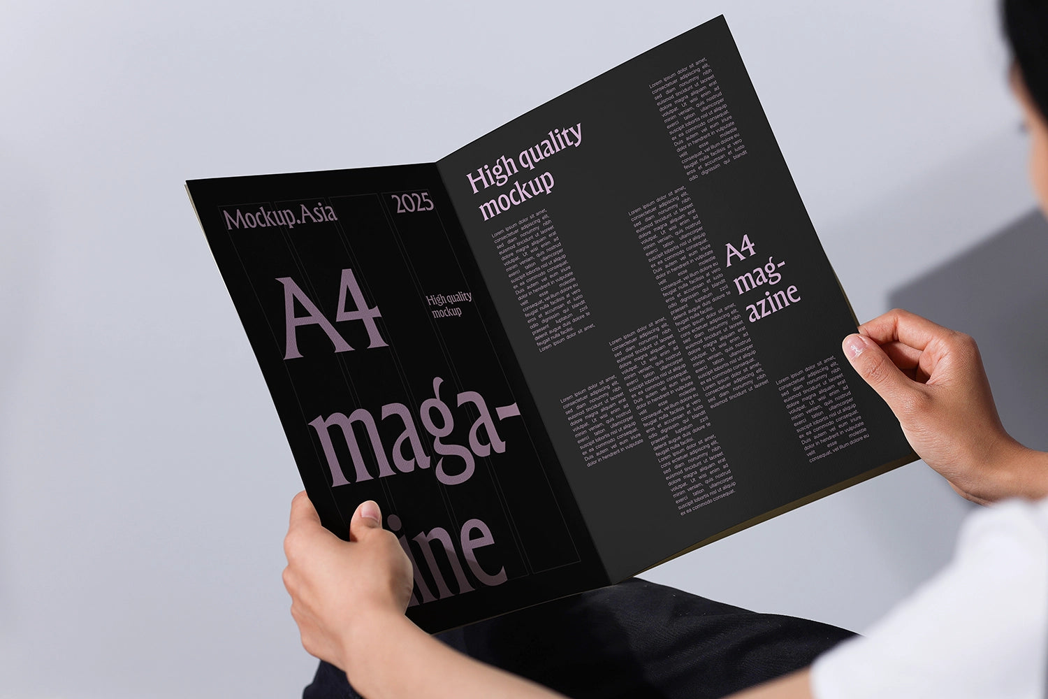 realistic magazine mockup in hand open spread minimal typography layout high resolution psd