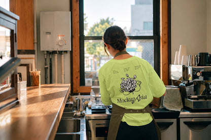 White t-shirt back print mockup with lime green apron café staff 