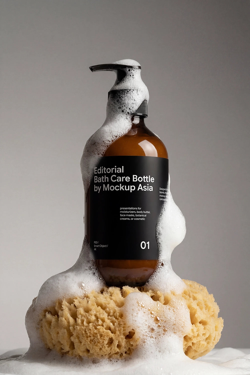 Realistic shampoo bottle mockup with editable label and soap foam.