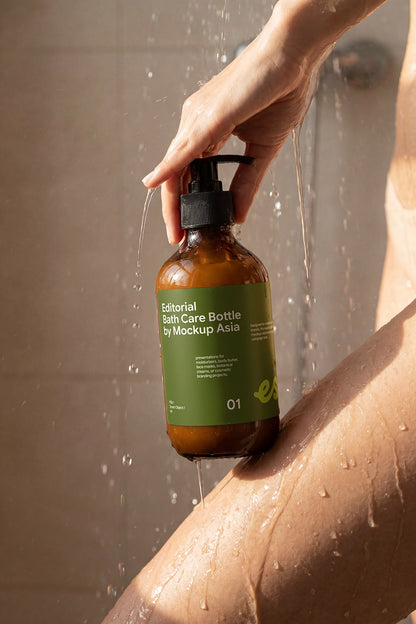 Body wash bottle mockup with realistic water droplets for packaging presentation.
