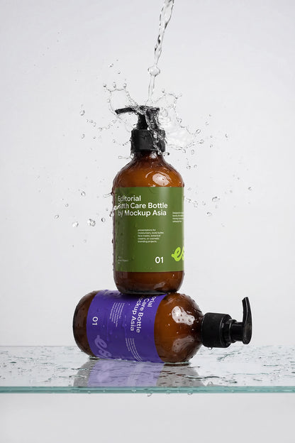 Body wash pump bottle mockup with water droplets for branding presentation.