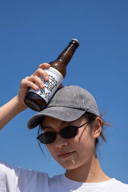Beer bottle PSD mockup with natural sunlight and editable label surface