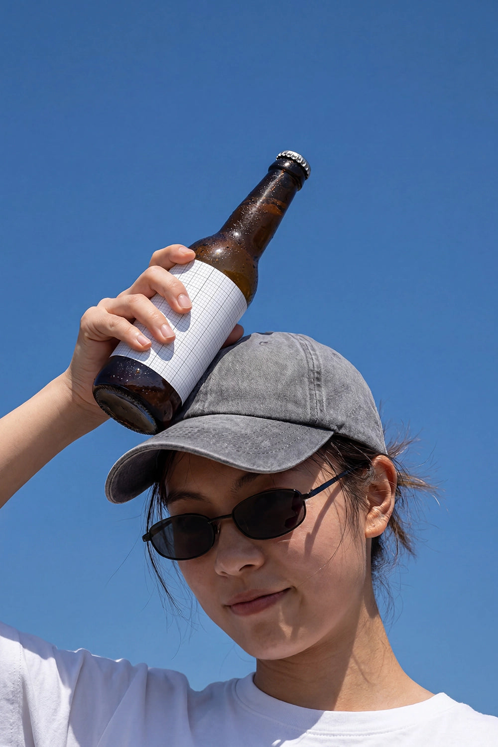 Beer bottle PSD mockup with natural sunlight and editable label surface