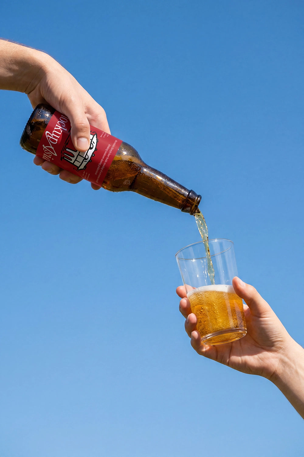 Lifestyle beer branding mockup with realistic liquid motion and sunlight