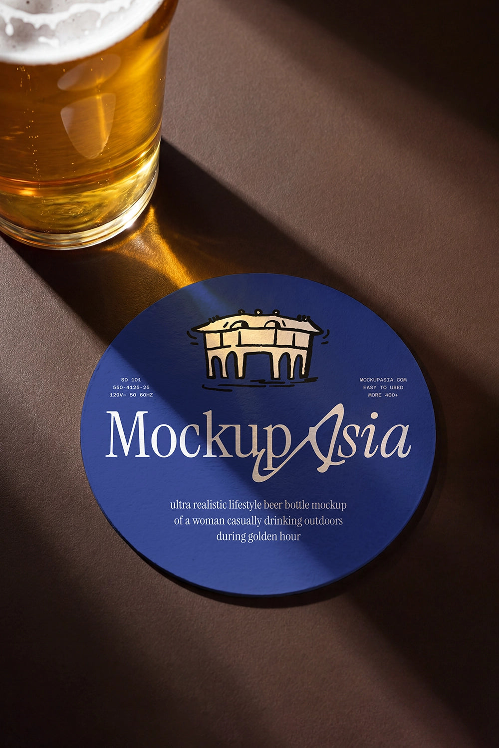 Bar coaster PSD mockup beside glass of beer on dark tabletop