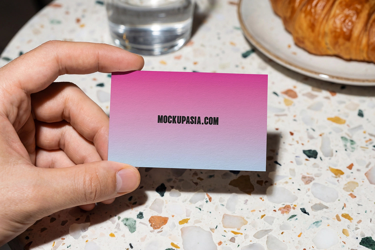 minimal brand card mockup with bold lighting and realistic hand interaction