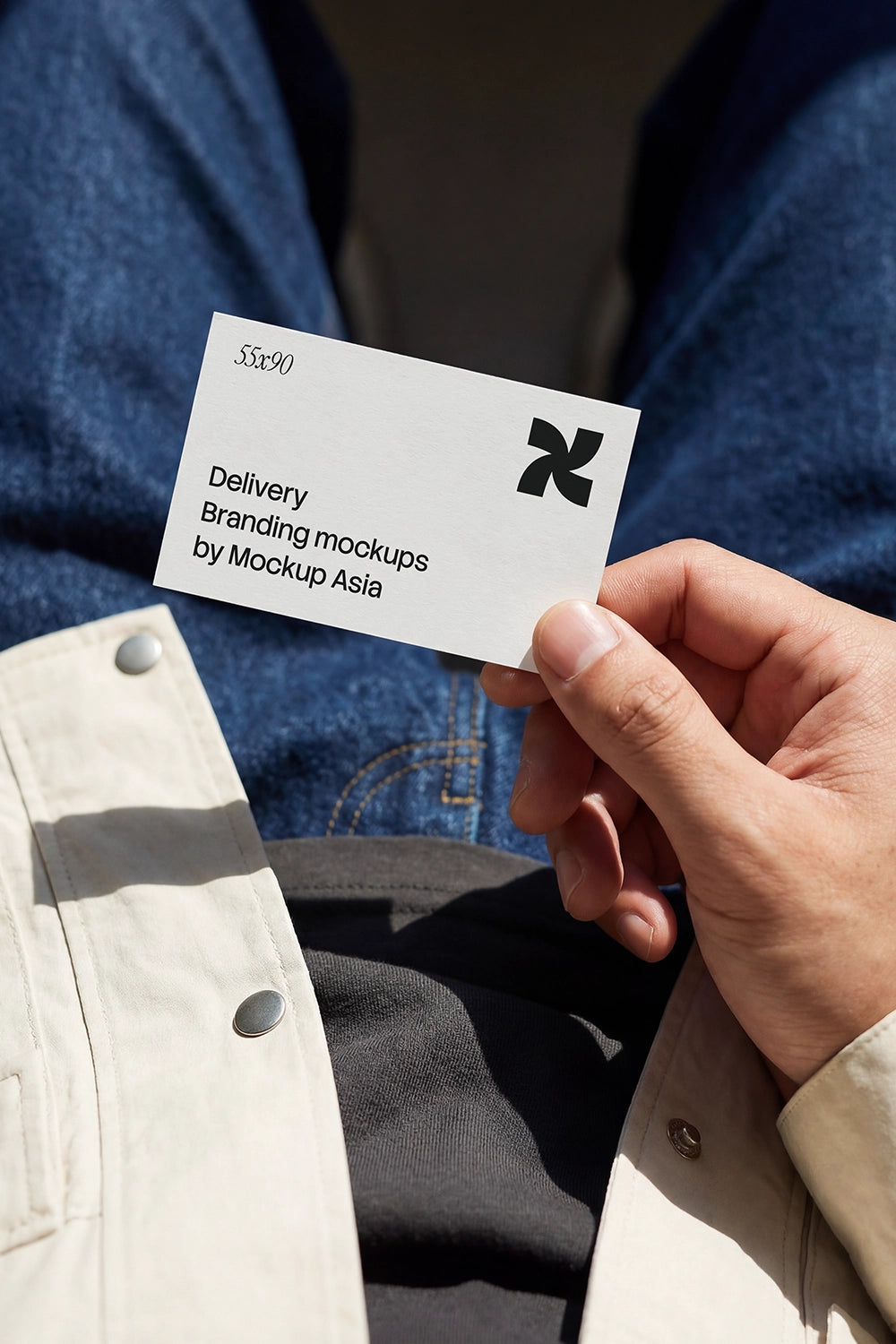 Single business card POV mockup held in hand