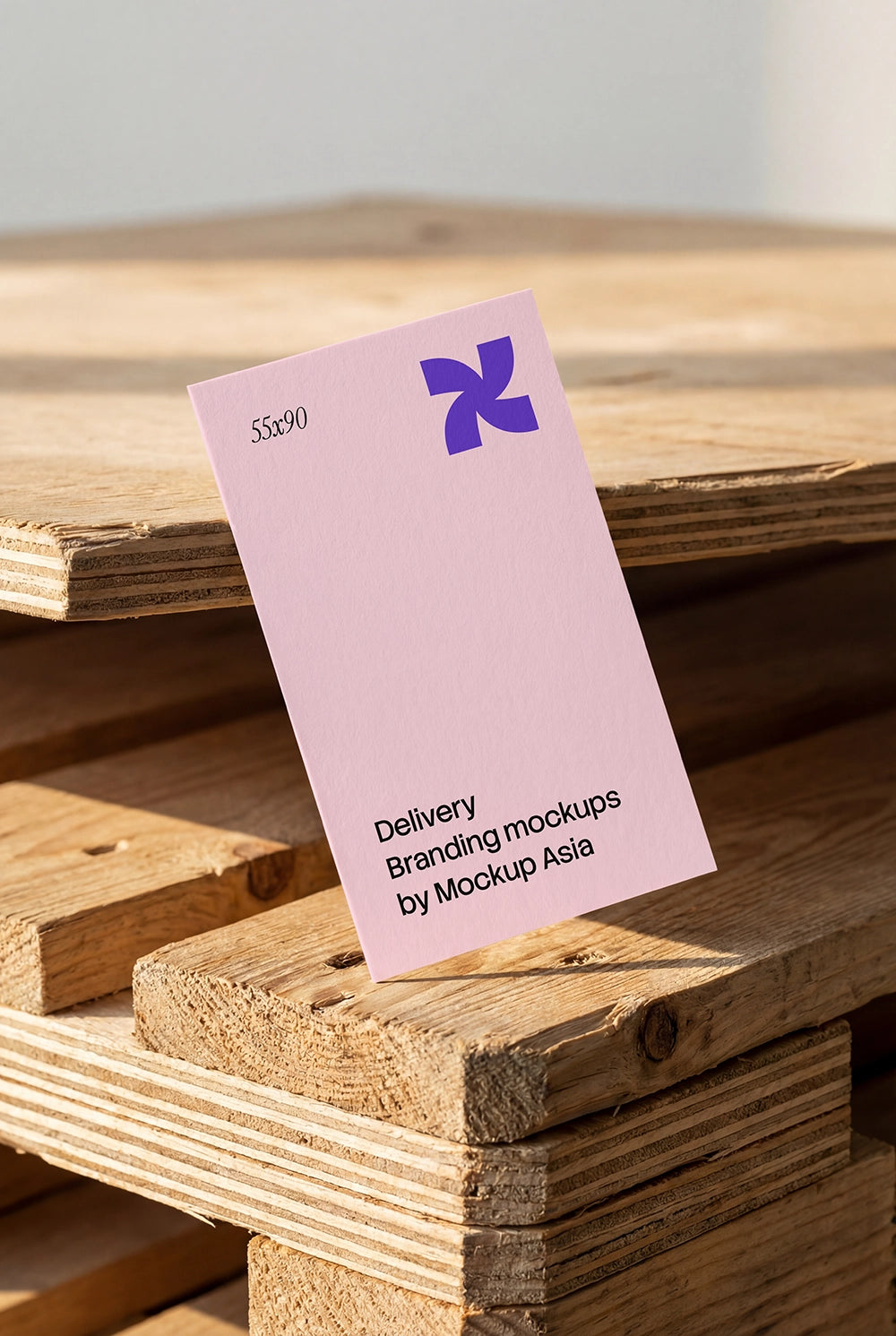 Business card mockup PSD with standing card on wooden pallet