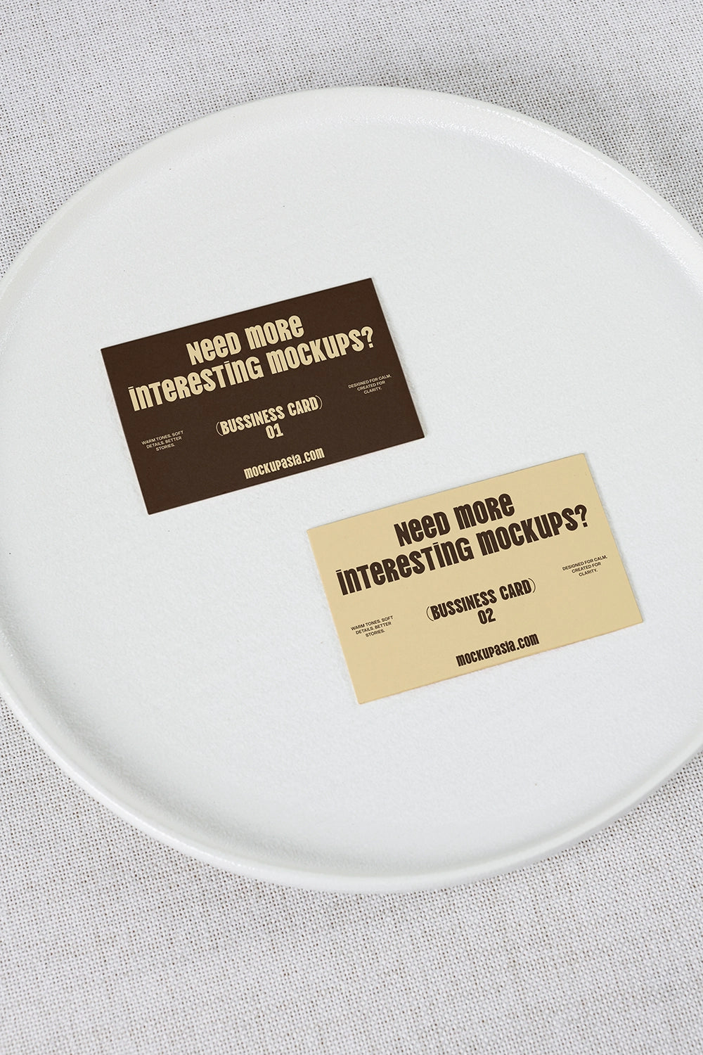realistic business card mockup with dual cards on ceramic plate and clean background