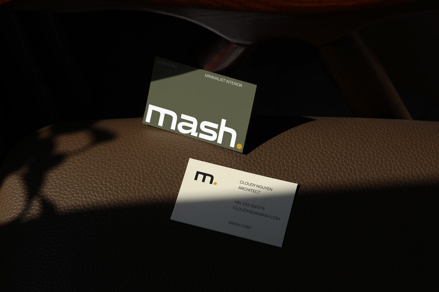 minimal business card mockup on leather surface with dramatic sunlight and natural shadow overlay