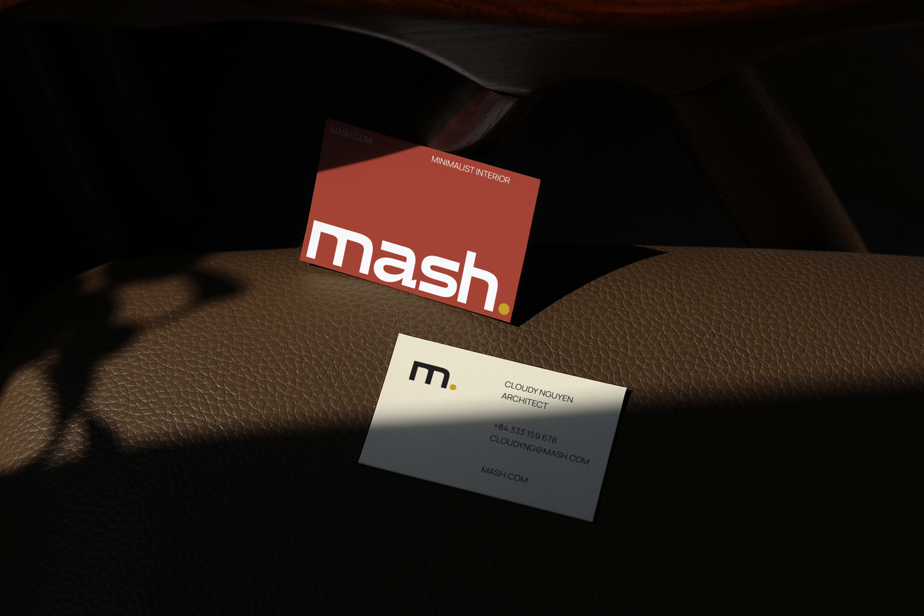 realistic branding business card mockup on brown leather background with soft light and shadow