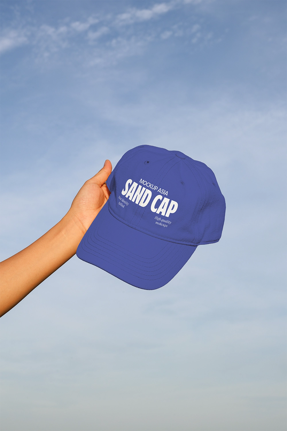 realistic cap mockup with minimal branding and outdoor lifestyle setting