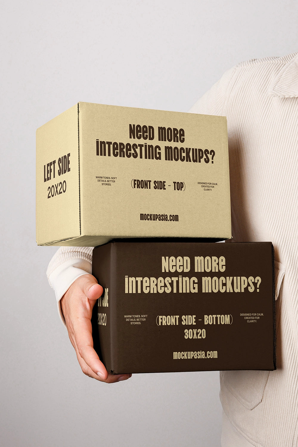 Cardboard box packaging mockup with typography design and realistic handheld presentation