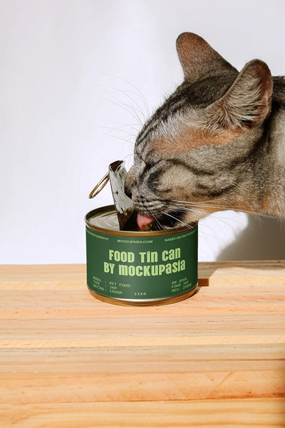 Mockup of a cat food tin can by Mockup.Asia, showing a silver metal can with a label, used for cat food product presentation.
