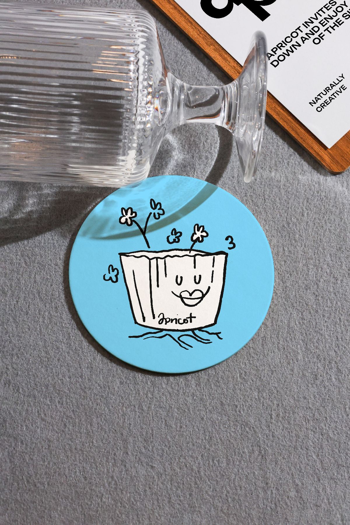 Mockup.Asia Apricots Coffee Collection bundle coaster featuring apricot illustrations on a neutral background.