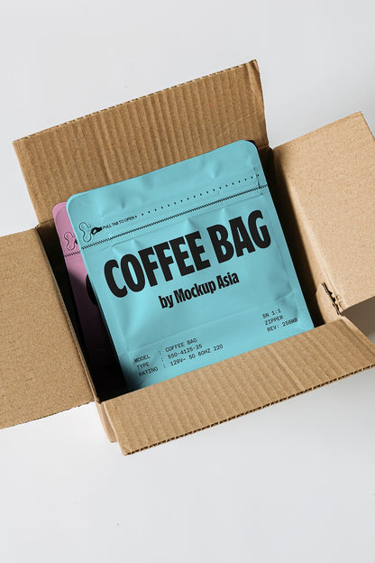 stand up coffee pouch mockup in open box, realistic ecommerce packaging scene