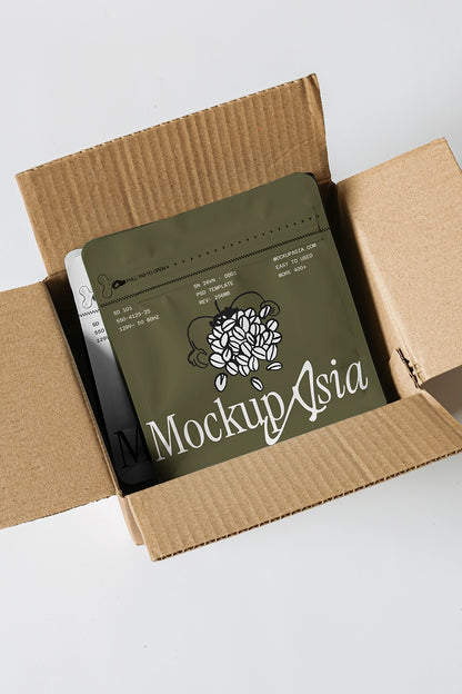 coffee pouch mockup in cardboard shipping box with colorful packaging, realistic delivery presentation