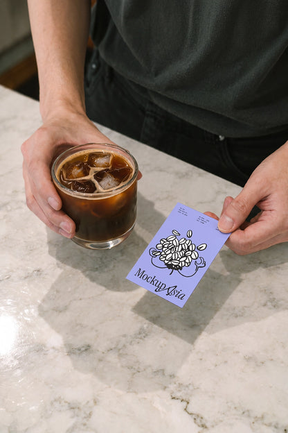 Café business card mockup hand offering card film tone