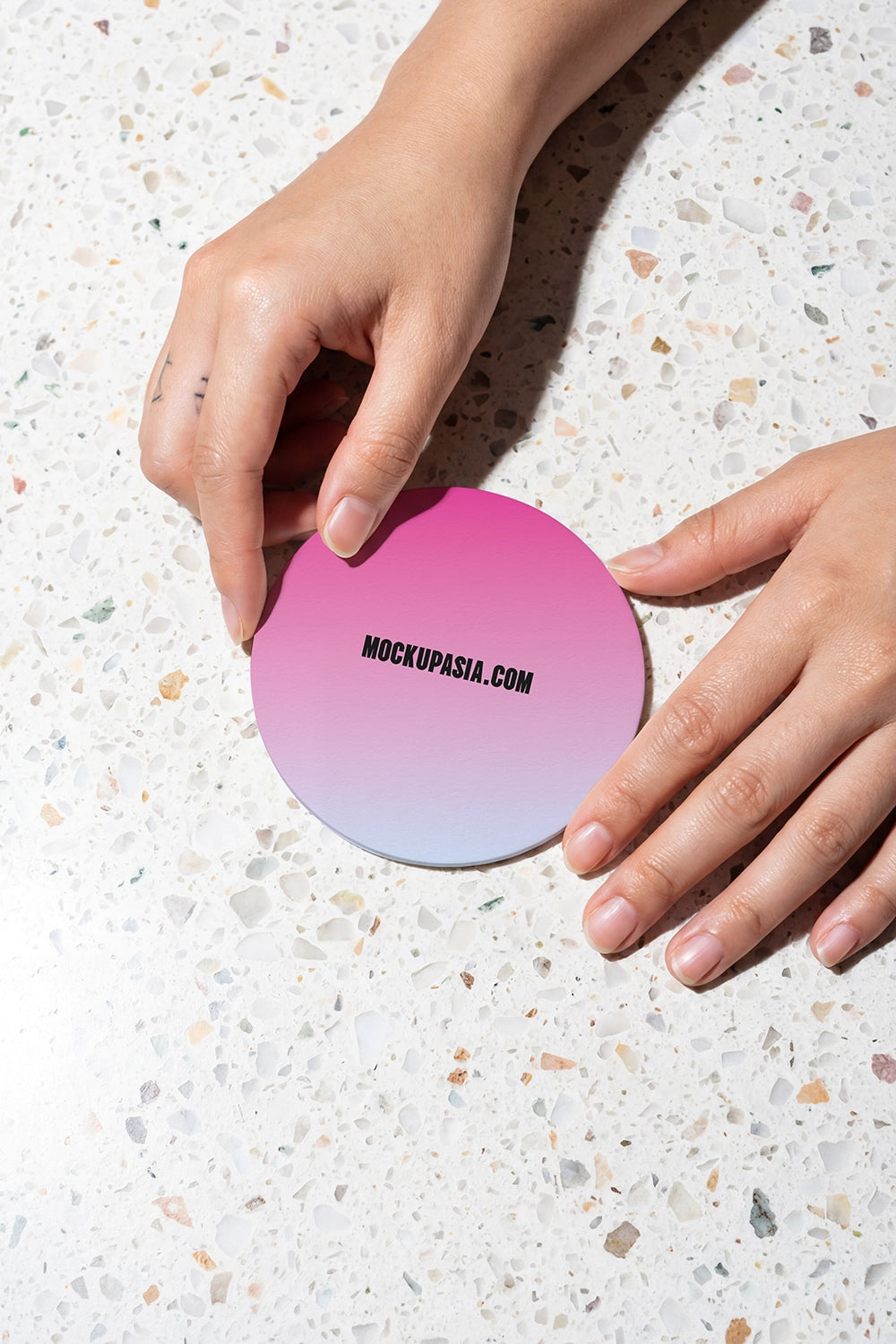 cafe coaster mockup with bold lighting and minimal circular design