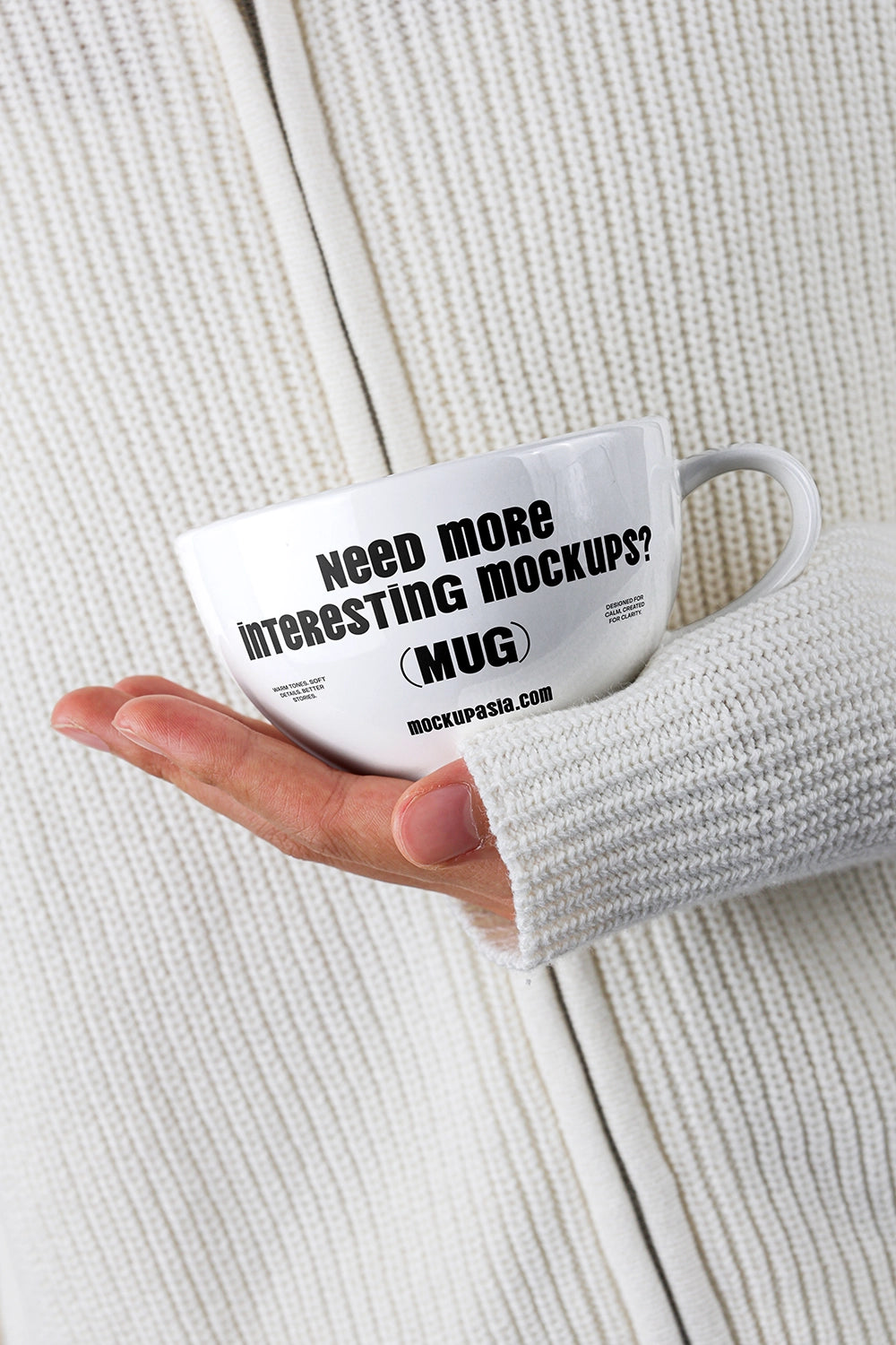 ceramic mug mockup held in hand with minimal design and soft neutral background