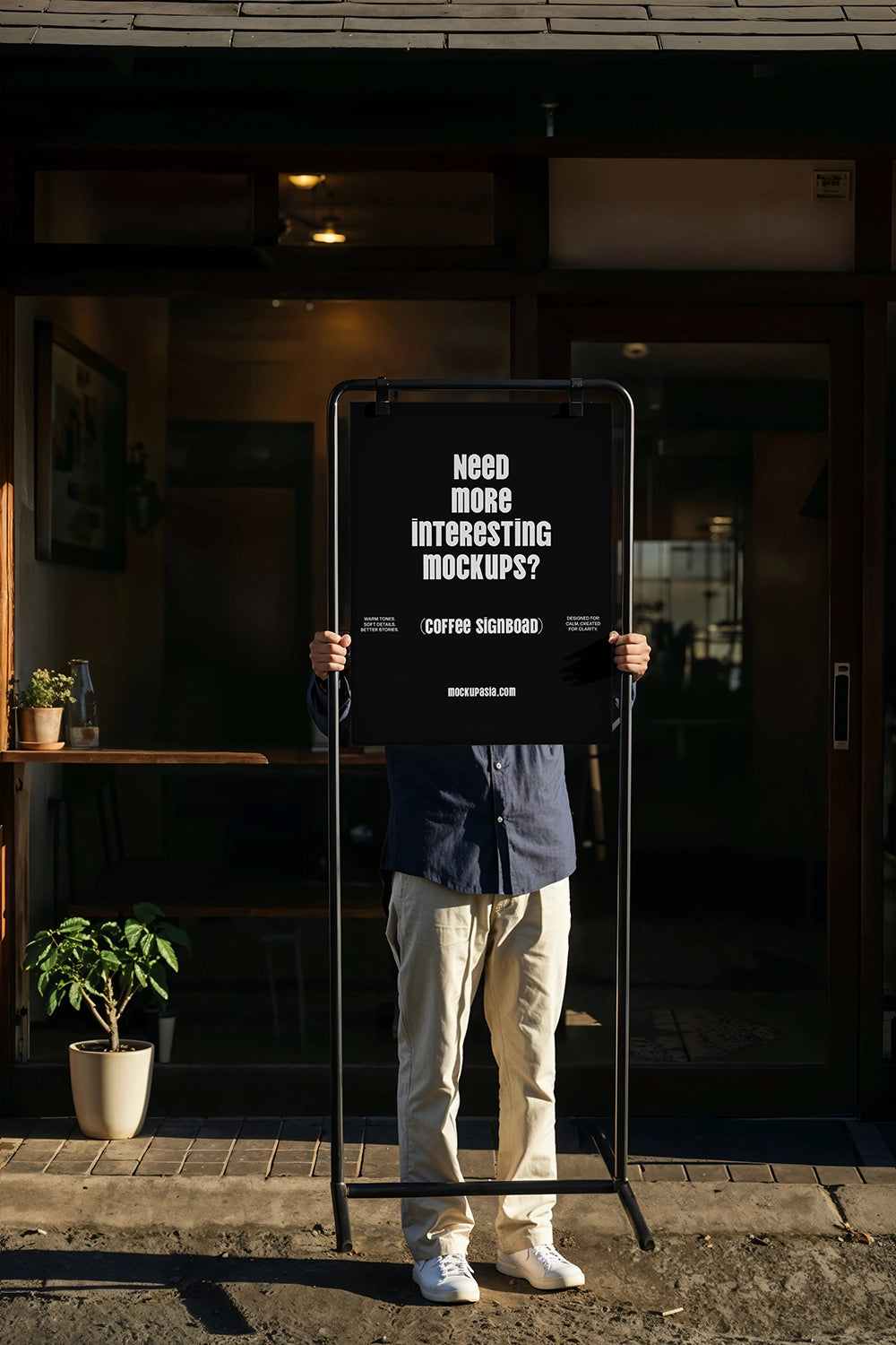 realistic A-frame signboard mockup outside cafe with human interaction and lifestyle setting