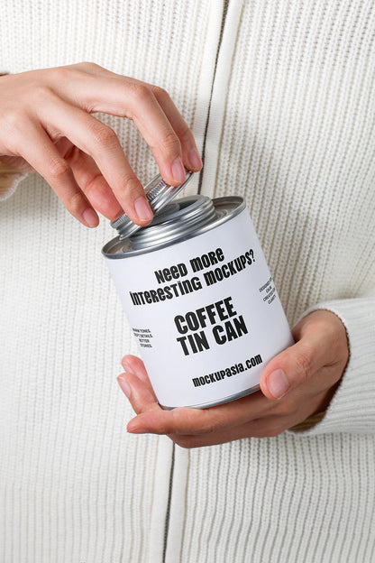 coffee tin can mockup opened by hands with removable lid, realistic packaging interaction scene