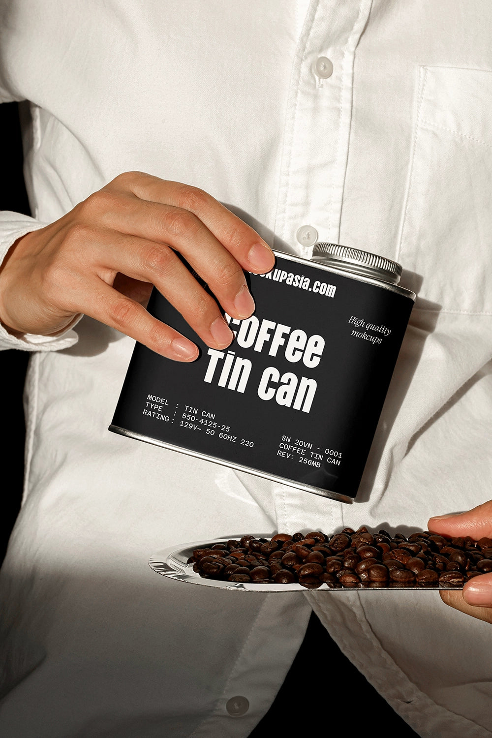 coffee packaging tin mockup with beans and hand interaction, lifestyle product scene