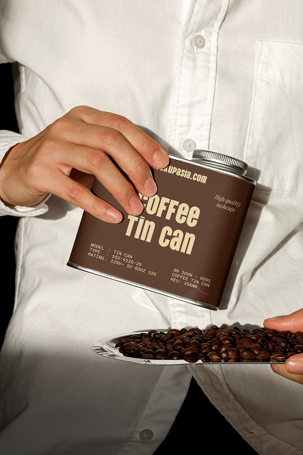 metal coffee tin can mockup with coffee beans on plate, modern branding setup