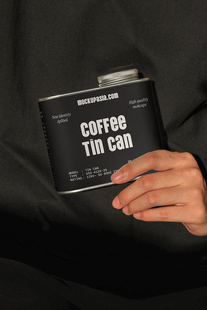 coffee packaging tin mockup with hand holding container, premium and modern branding scene