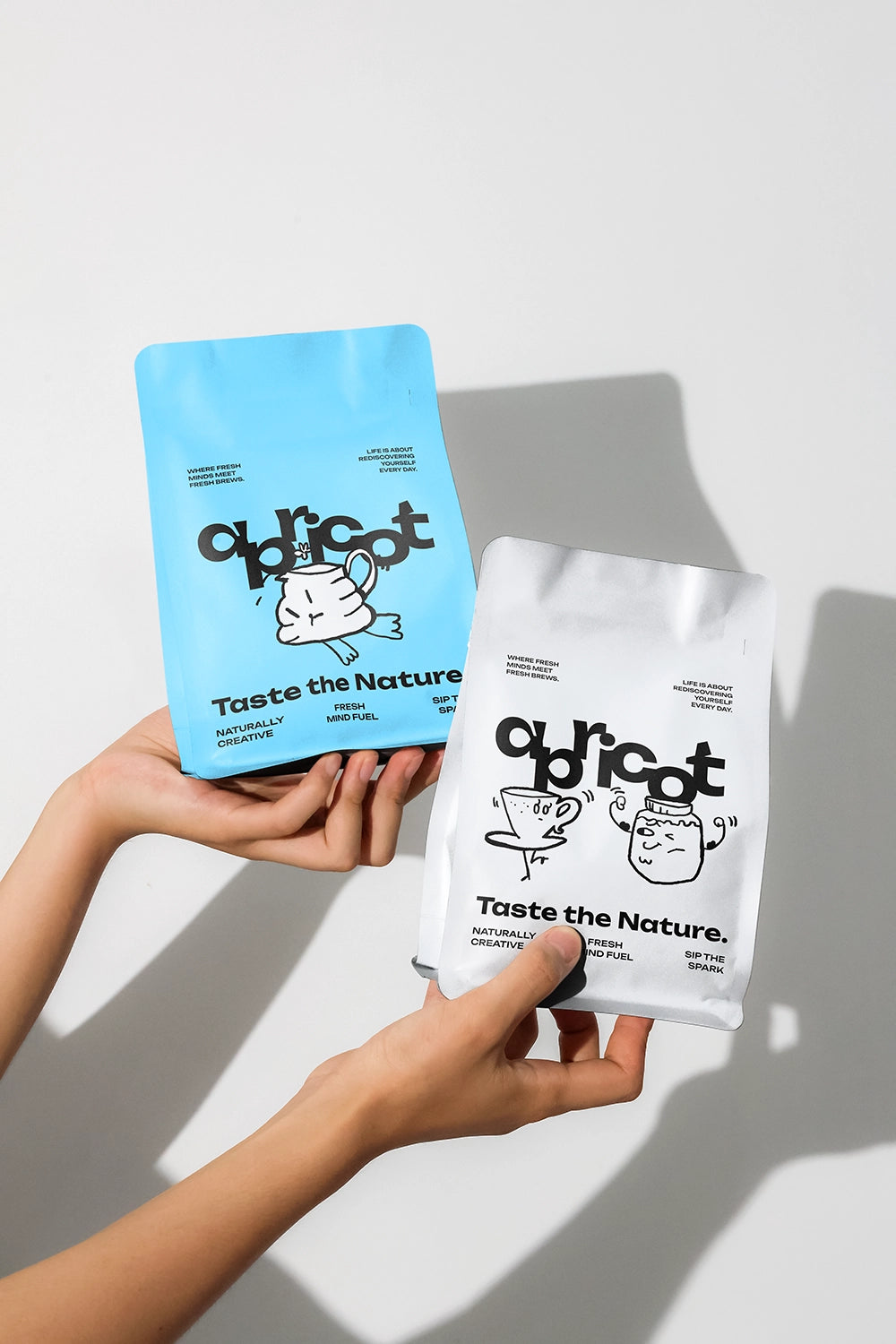 doypack packaging mockup in hands with blank design space, minimal branding setup