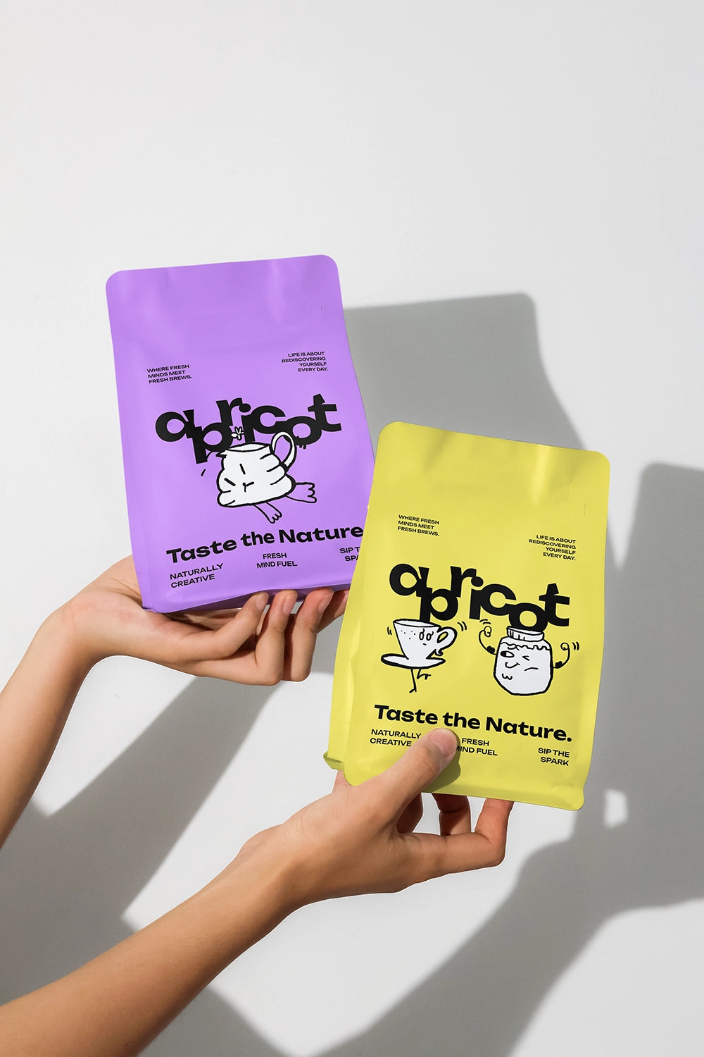 flexible packaging mockup with blank label in hands, clean lighting and lifestyle presentation
