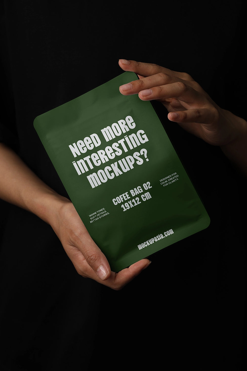 stand up coffee pouch mockup with hand interaction, minimal and dramatic lighting scene