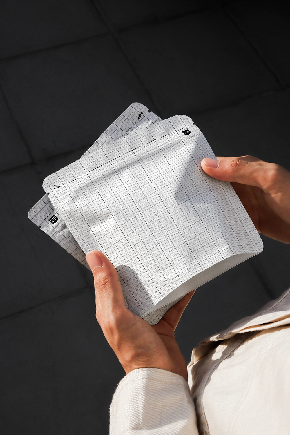 Front angled coffee pouch mockup with minimalist label design and resealable zip closure