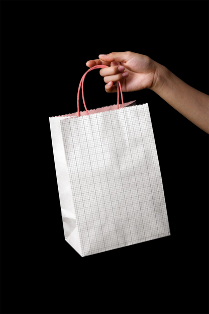 white kraft bag mockup with logo branding, high contrast black background