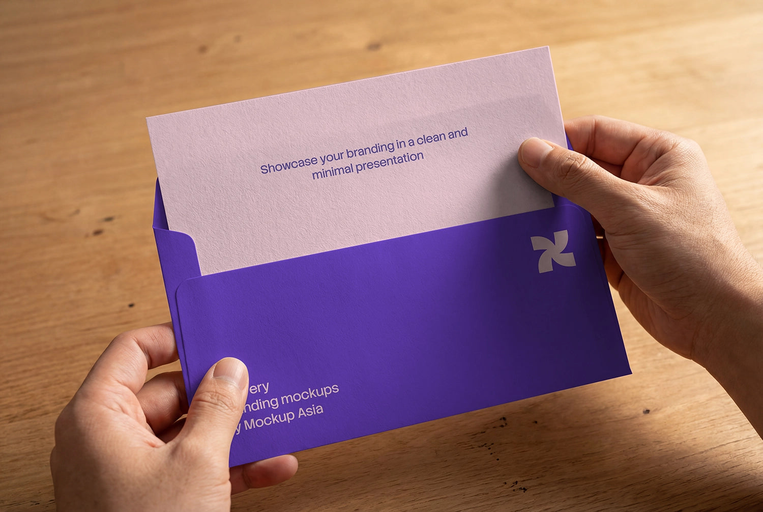 Stationery branding mockup with envelope and letterhead on wooden table