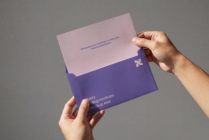 Handheld stationery branding mockup with envelope and letterhead
