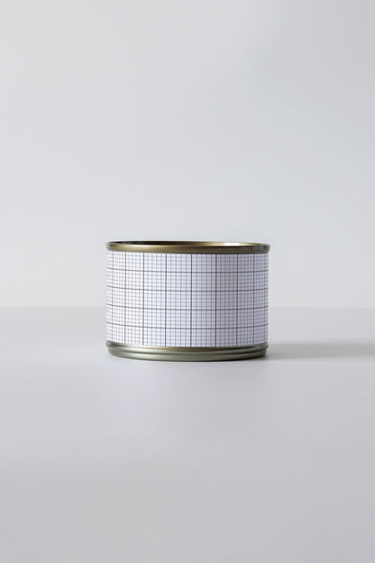 realistic metal food can mockup with blank label and soft studio lighting
