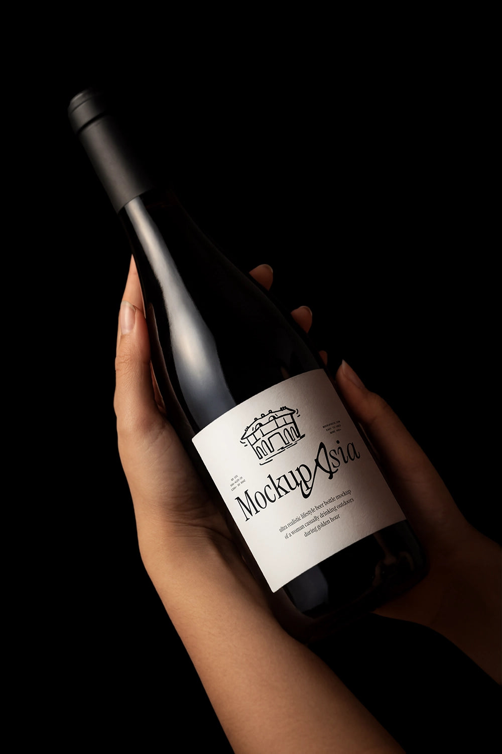 Premium glass bottle mockup held in hands with realistic studio lighting