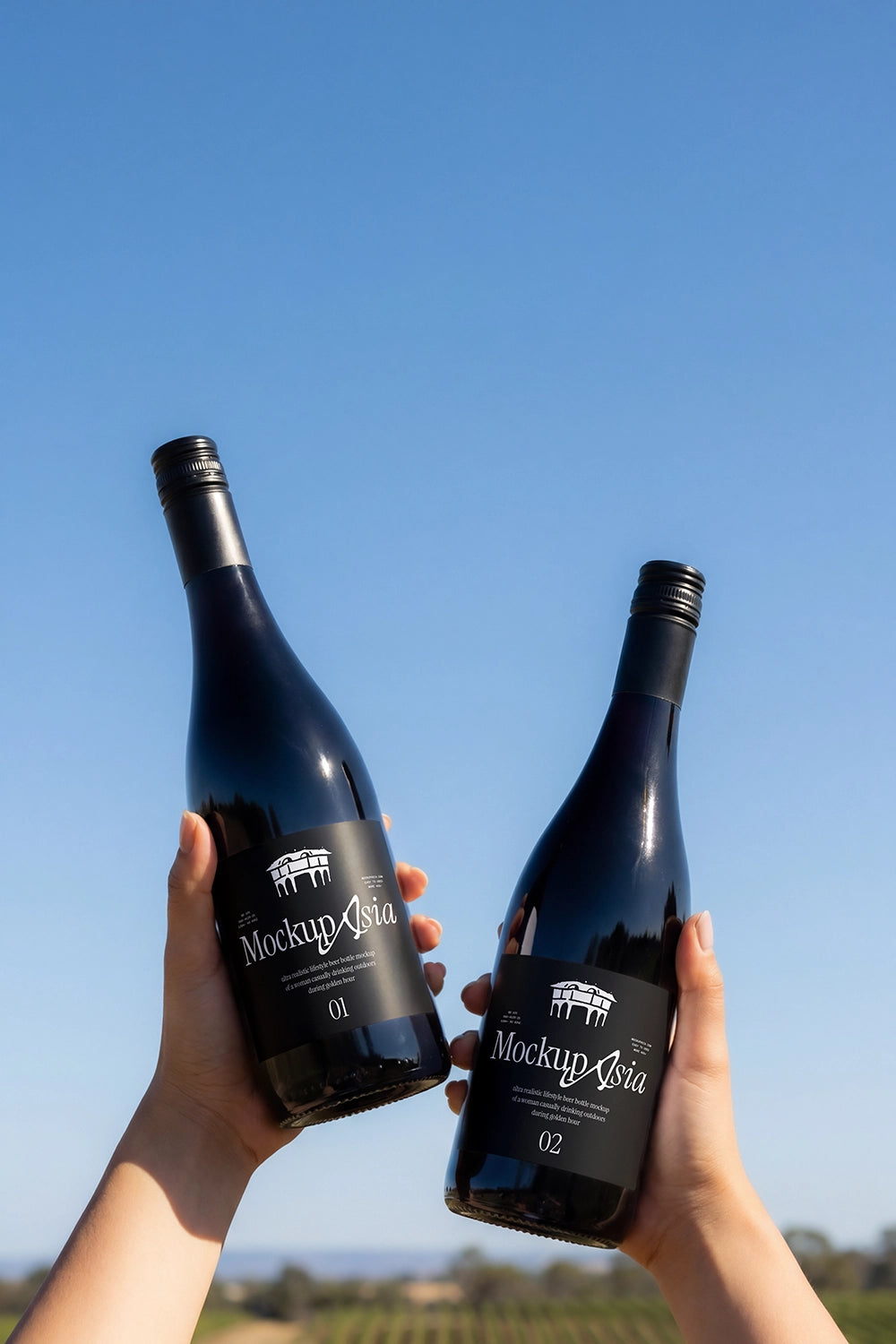 Two premium bottle mockups with realistic reflections and branding surfaces