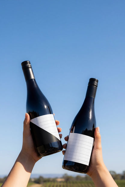 High resolution dual bottle branding mockup with outdoor lifestyle presentation