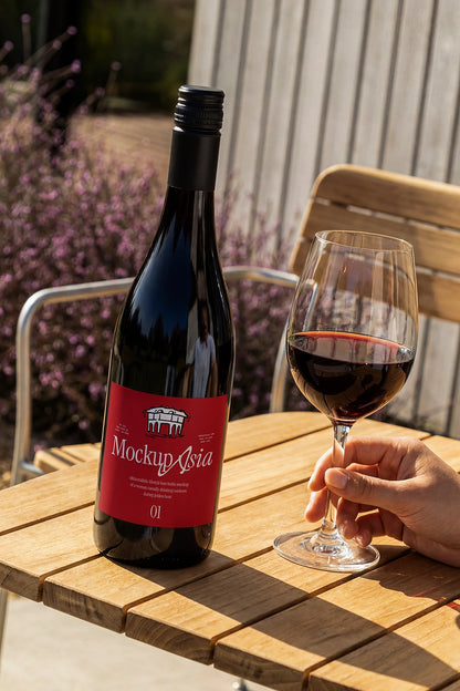 Realistic bottle label mockup photographed in warm lifestyle environment