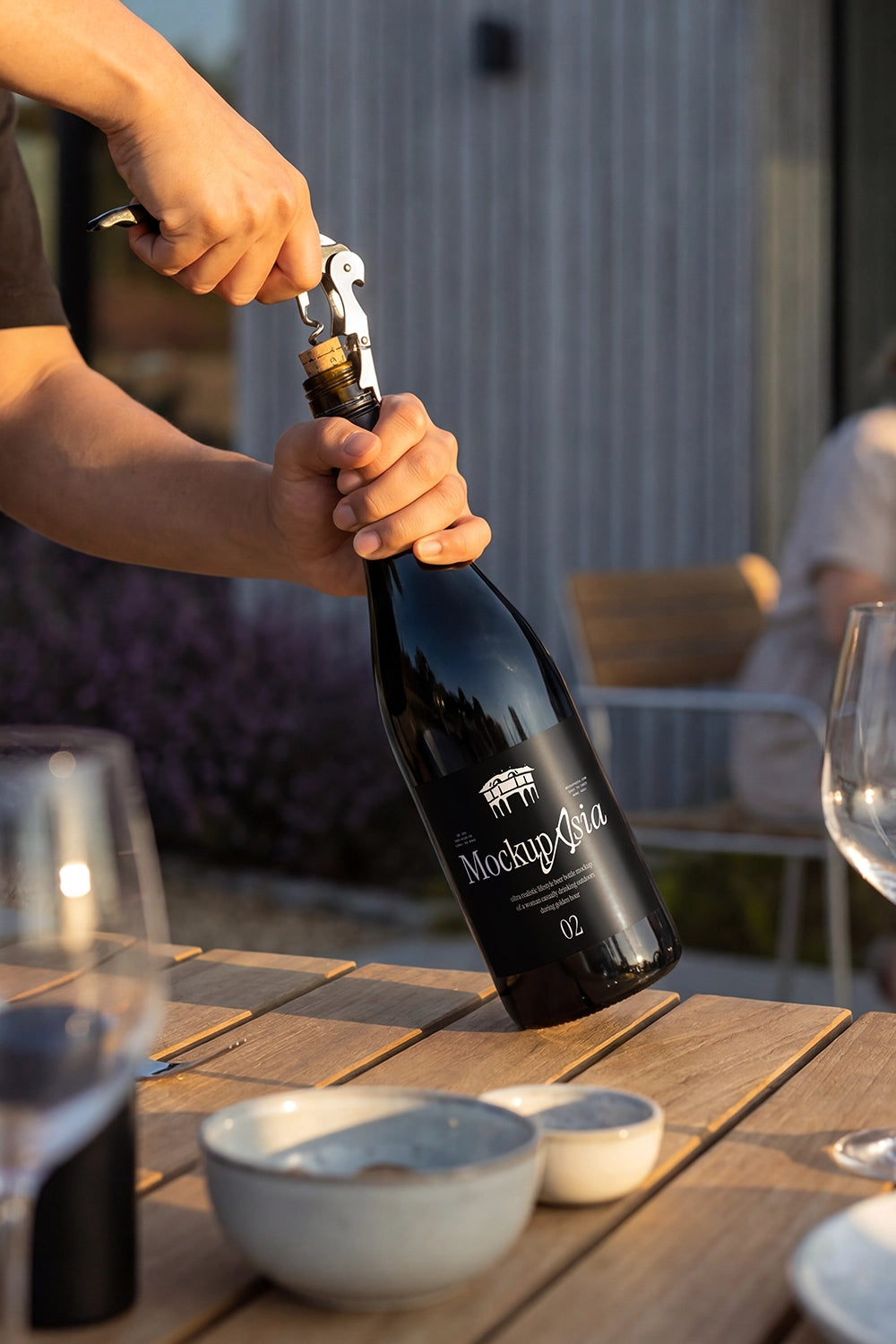 Realistic bottle packaging mockup featuring hands opening glass bottle