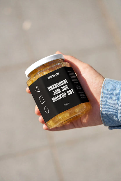 Realistic glass preserve jar mockup featuring wrap-around label design