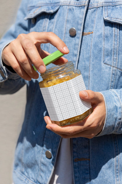 Gourmet jam jar branding mockup with natural outdoor lighting