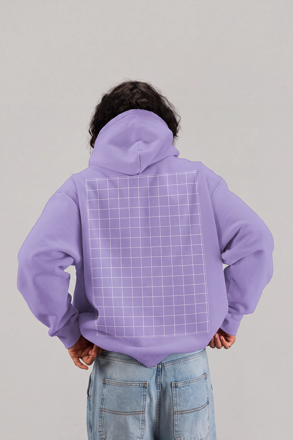 Hoodie design mockup worn with relaxed fit jeans