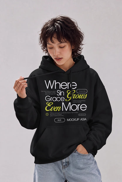 Blank white oversized hoodie mockup worn by a model